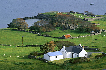 House and graveyard at Sound, Weisdale Voe, Mainland, Shetland Islands, Scotland, United Kingdom, Europe