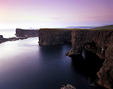 Eshaness basalt cliffs, deeply eroded with caves, blowholes and stacks, Northmavine, Shetland Islands, Scotland, United Kingdom, Europe