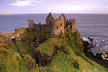 Dunluce castle, spectacular castle-crowned crag, Antrim coast, near Portrush, County Antrim, Ulster, Northern Ireland, United Kingdom, Europe