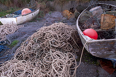 Old fishing boats, nets and ropes, near Kilmuir, Trotternish, Isle of Skye, Inner Hebrides, Scotland, United Kingdom, Europe