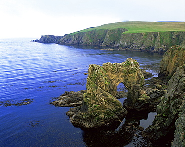 Natural arch on the east coast, Fair Isle, Shetland Islands, Scotland, United Kingdom, Europe