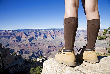 Woman looking over Grand Canyon, Grand Canyon National Park, UNESCO World Heritage Site, Arizona, United States of America, North America