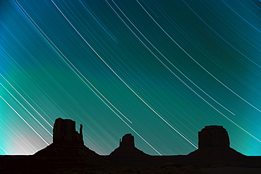 Long exposure of star trails in night sky, Monument Valley Navajo Tribal Park, Arizona Utah border, United States of America, North America