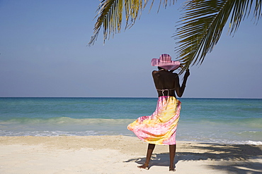 Jamaican woman on beach, Negril, Jamaica, West Indies, Caribbean, Central America