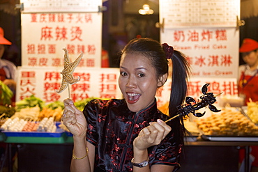 Asian woman (Chinese-Thai), Dong'anmen food market, Wanfungjing, Beijing, China, Asia