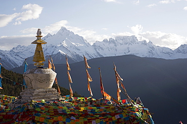 Buddhist stupa on way to Deqin, on the Tibetan Border, with the Meili Snow Mountain peak in the background, Dequin, Shangri-La region, Yunnan Province, China, Asia