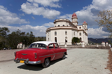 Old Chevrolet at the Church of Caridad del Cobre, Santiago de Cuba, Santiago de Cuba Province, Cuba, West Indies, Central America