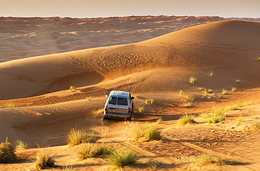 Four wheel drive on desert dunes, Wahiba, Oman, Middle East