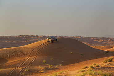 Four wheel drive on desert dunes, Wahiba, Oman, Middle East