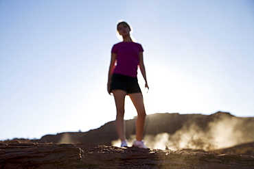 Woman jogging, Monument Valley Navajo Tribal Park, Arizona Utah border, United States of America, North America