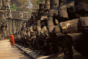 Buddhist monk approaching South Gate, Angkor Thom, Angkor, UNESCO World Heritage Site, Siem Reap, Cambodia, Indochina, Southeast Asia, Asia