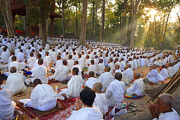 Buddhist monks and nuns gather for a ceremony for peace, Bayon temple, Angkor, Cambodia, Indochina, Southeast Asia, Asia