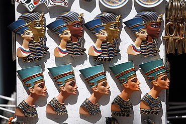 Various Egyptian badges depicting pharaohs, on sale at Aswan Souq, Aswan, Egypt, North Africa, Africa