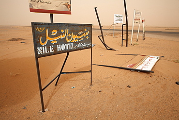 Signposts stand in the desert along the Khartoum to Atbara highway, Sudan, Africa