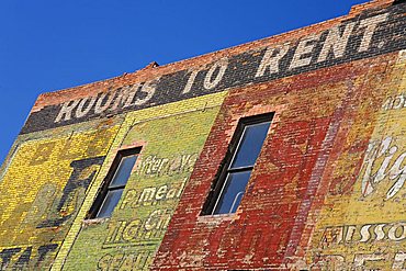 Faded murals on the Grand Hotel, National Historic District, Butte, Montana, United States of America, North America