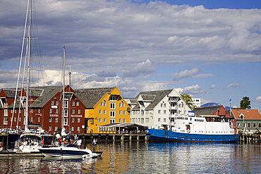 Boats and warehouses on Skansen Docks, Tromso City, Troms County, Norway, Scandinavia, Europe