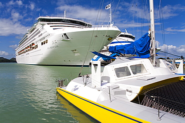 Catamaran and cruise ships, Heritage Quay, St. Johns, Antigua Island, Antigua and Barbuda, Leeward Islands, Lesser Antilles, West Indies, Caribbean, Central America