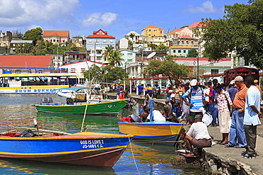 Selling fish in The Carenage, St. Georges, Grenada, Windward Islands, West Indies, Caribbean, Central America