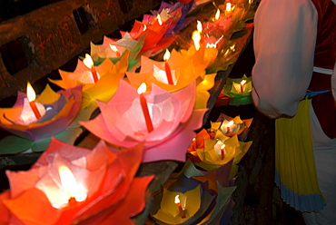 Selling floating prayer candles, night, Lijiang old town , Yunnan, China, Asia