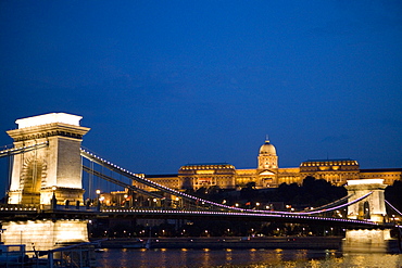 Chain Bridge over Danube with Royal Palace beyond in the evening, Budapest, Hungary, Europe