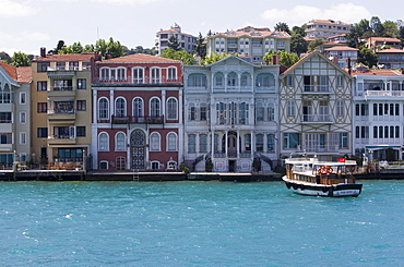 The restored waterfront buildings of Yenikoy on the Bosphorus, Istanbul, Turkey, Europe