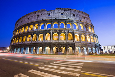 Colosseum amphitheatre, UNESCO World Heritage Site, and via Dei Fori Imperiali at night, Rome, Lazio, Italy, Europe