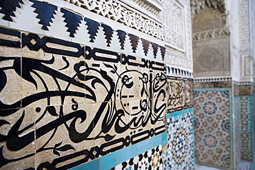 Arabic calligraphy and Zellij tilework, Bou Inania Medersa, Meknes, Morocco, North Africa, Africa