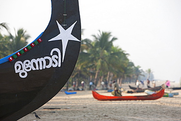 Traditional fishing boats at Marari Beach, Kerala, India, Asia 