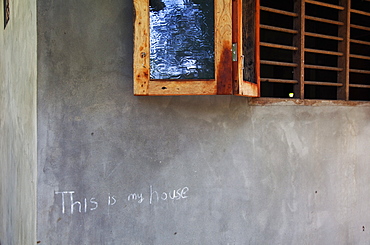 Chalk sign on a house in Mararikulam, Kerala, India, Asia 