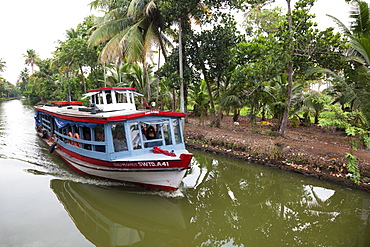 Ferry boat travelling on the Kerala Backwaters, Kerala, India, Asia 