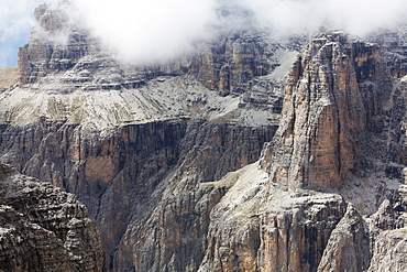 Cloud on the dramatic Sass Pordoi mountain in the Dolomites near Canazei, Trentino-Alto Adige, Italy, Europe 