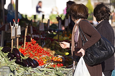 Women shopping in market in Alberobello, Puglia, Italy, Europe