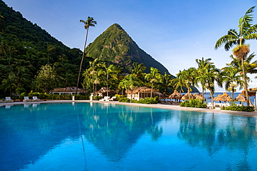 Gros Piton, UNESCO World Heritage Site, and reflection in the swimming pool at Sugar Beach, St. Lucia, Windward Islands, West Indies, Caribbean, Central America