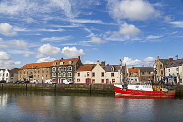 Traditional fishing boat in the sheltered harbour at Eyemouth, Berwickshire, Scottish Borders, Scotland, United Kingdom, Europe