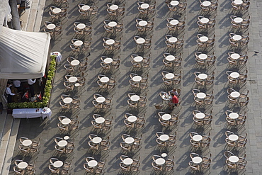 View from Campanile of two diners and musicians at Open Air Cafe, St. Mark's Square, Venice, Veneto, Italy, Europe