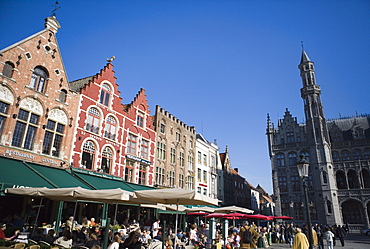 Cafes and restaurants in Main Square (Markt), Bruges, Belgium, Europe