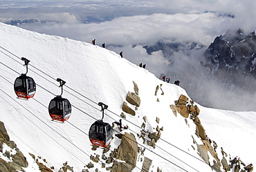 Cable cars approaching Aiguille du Midi summit, Chamonix-Mont-Blanc, French Alps, France, Europe