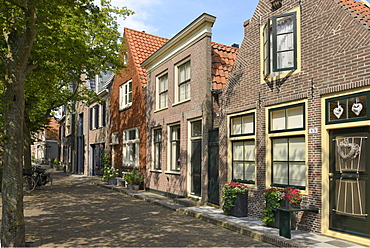 Street of uniquely individual Dutch houses, Zuider Havendijk, Enkhuizen, North Holland, Netherlands, Europe