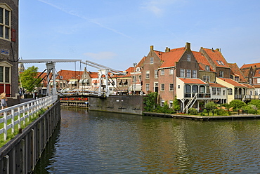 Bascule Bridge (Draw Bridge) and houses in the port of Enkhuizen, North Holland, Netherlands, Europe