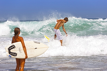 Couple of surfers, Esquinzo beach, Cotillo, Fuerteventura. Canary Islands, Spain, Atlantic, Europe