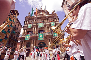 Clubs parade, San Fermin festival, and City Hall building, Pamplona, Navarra, Spain, Europe