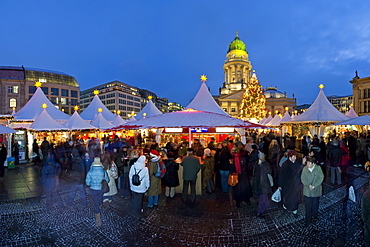 Traditional Christmas Market at Gendarmenmarkt illuminated at dusk, Berlin, Germany, Europe