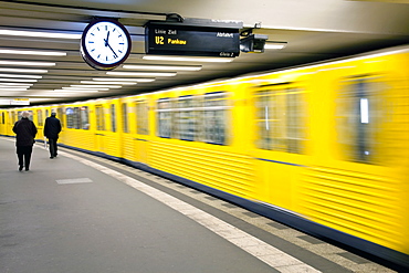 Moving train pulling into modern subway station, Berlin, Germany, Europe