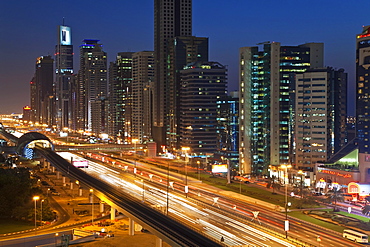 Elevated view over the modern skyscrapers along Sheikh Zayed Road looking towards the Burj Kalifa, Dubai, United Arab Emirates, Middle East