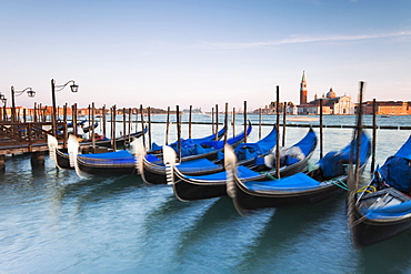 Quay at St Mark's Square with gondolas and the view to San Giorgio Maggiore Island, Venice, UNESCO World Heritage Site, Veneto, Italy, Europe