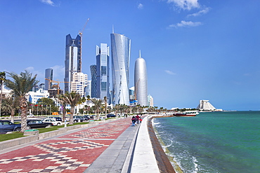 View along the Corniche towards the new skyline of the West Bay central financial district, Doha, Qatar, Middle East