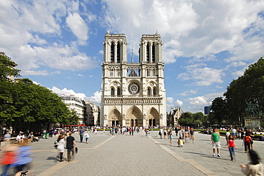 Tourists outside Notre Dame Cathedral, Paris, France, Europe