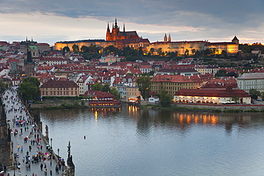 St. Vitus Cathedral, Charles Bridge, River Vltava and the Castle District illuminated at night, UNESCO World Heritage Site, Prague, Czech Republic, Europe