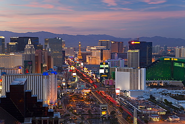 Elevated view of the hotels and casinos along The Strip at dusk, Las Vegas, Nevada, United States of America, North America