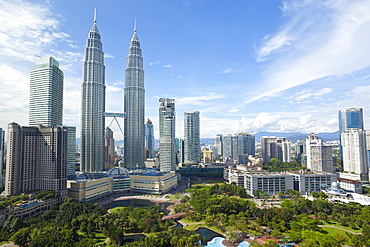 City centre including the KLCC park convention and shopping centre and the iconic 88 storey steel clad Petronas Towers, Kuala Lumpur, Malaysia, Southeast Asia, Asia